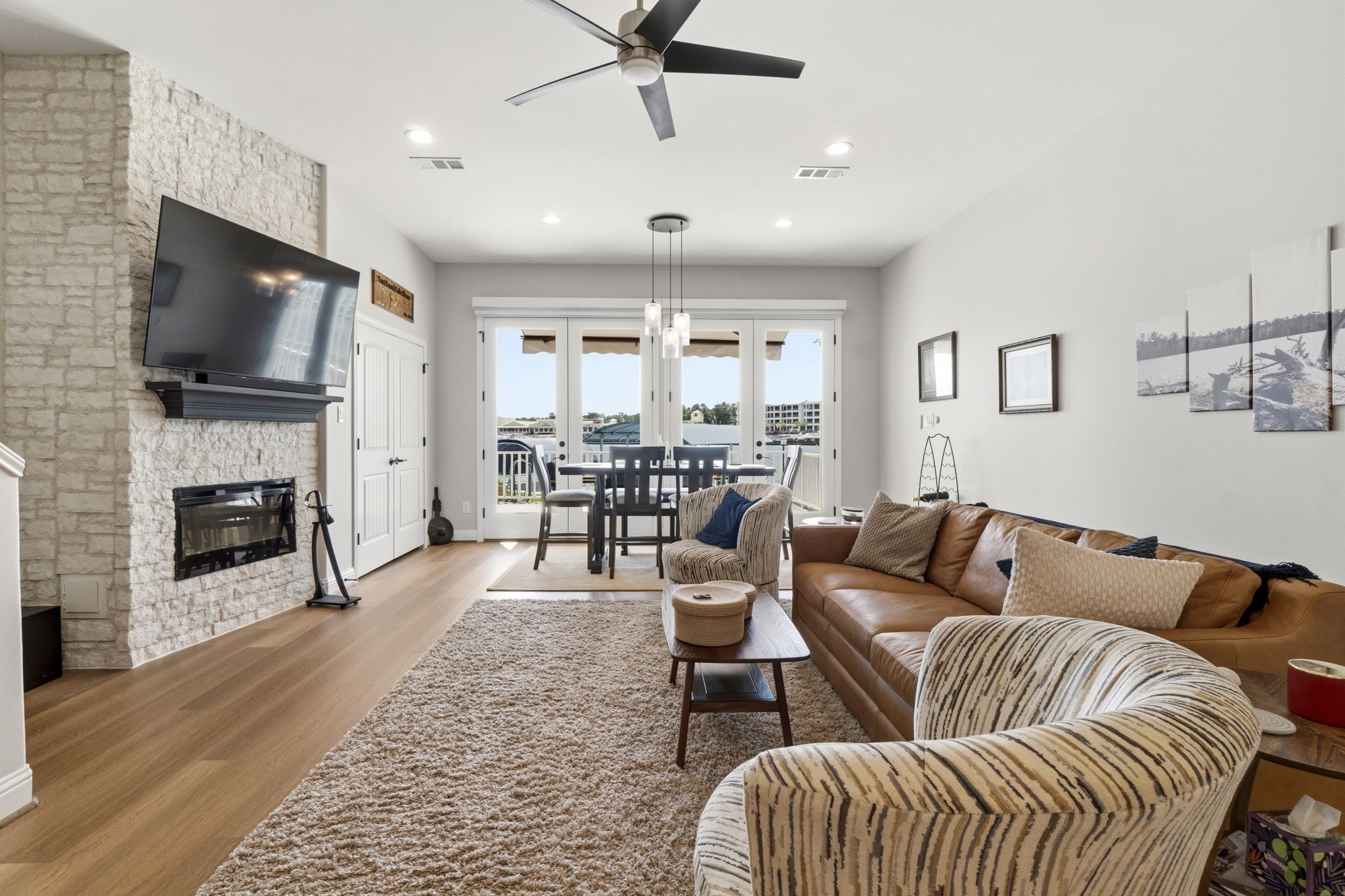 2 Key Harbour Conroe, TX 77356 - Photo 7 of 41 a living room with furniture fireplace and flat screen tv