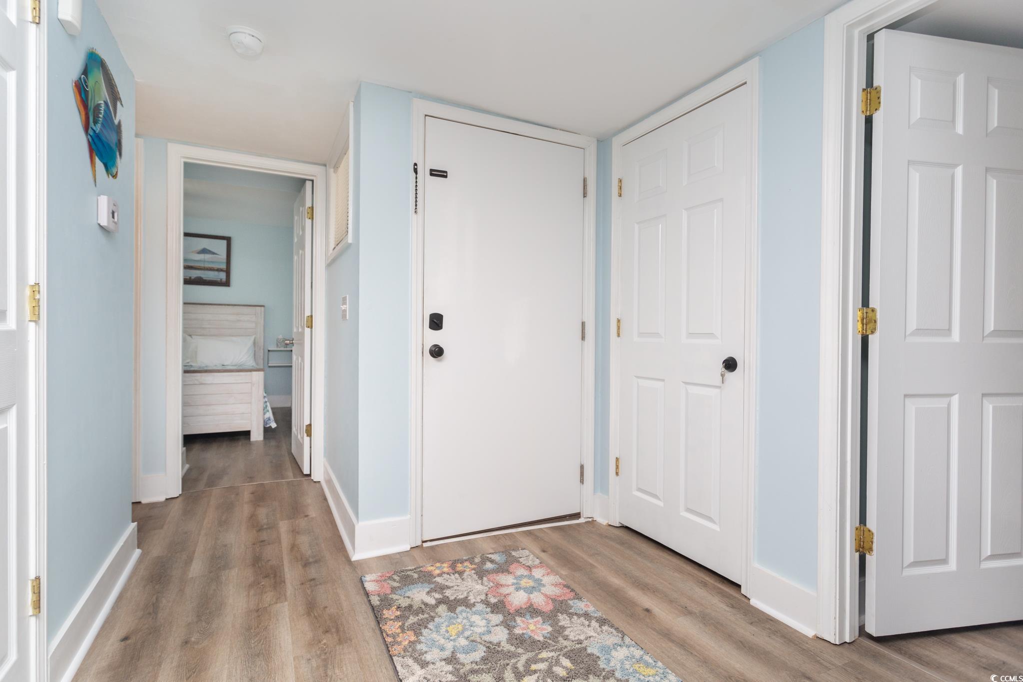 351 Lake Arrowhead Road, Unit 25404 Myrtle Beach, SC 29572 - Photo 10 of 37 Hallway featuring light hardwood / wood-style floors