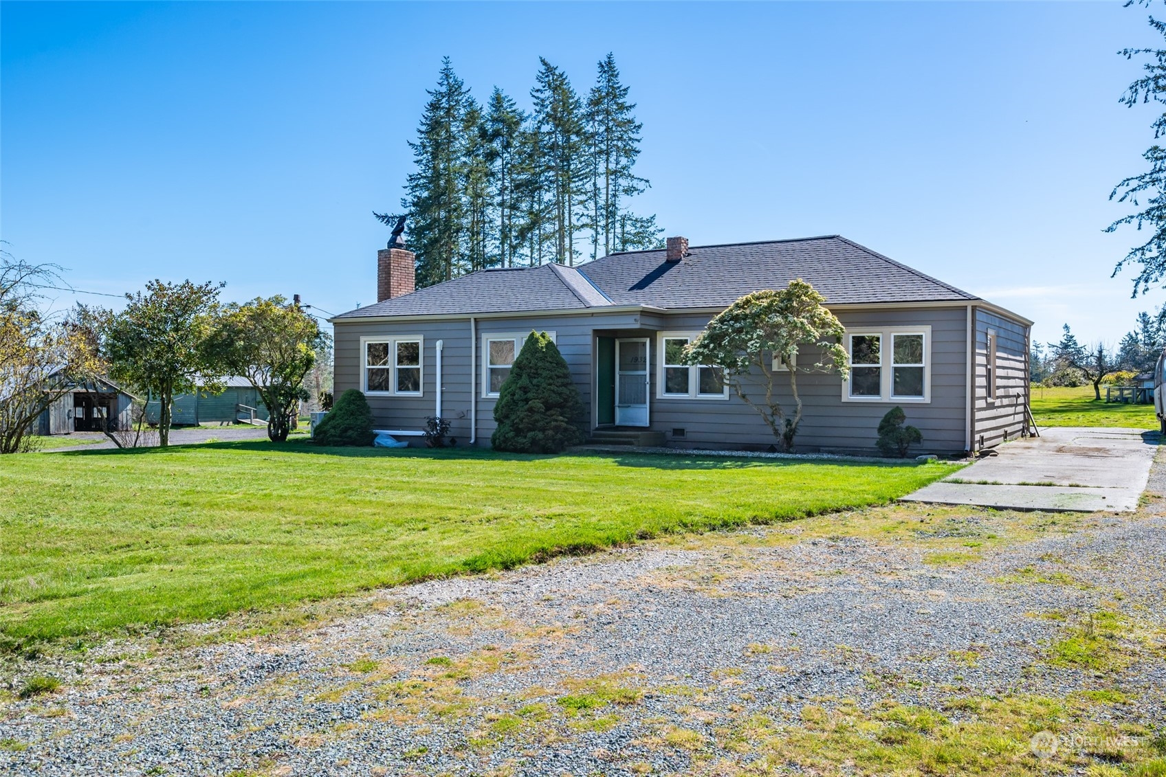 1932 Zylstra Road Oak Harbor, WA 98277 - Photo 2 of 40 a front view of a house with a yard