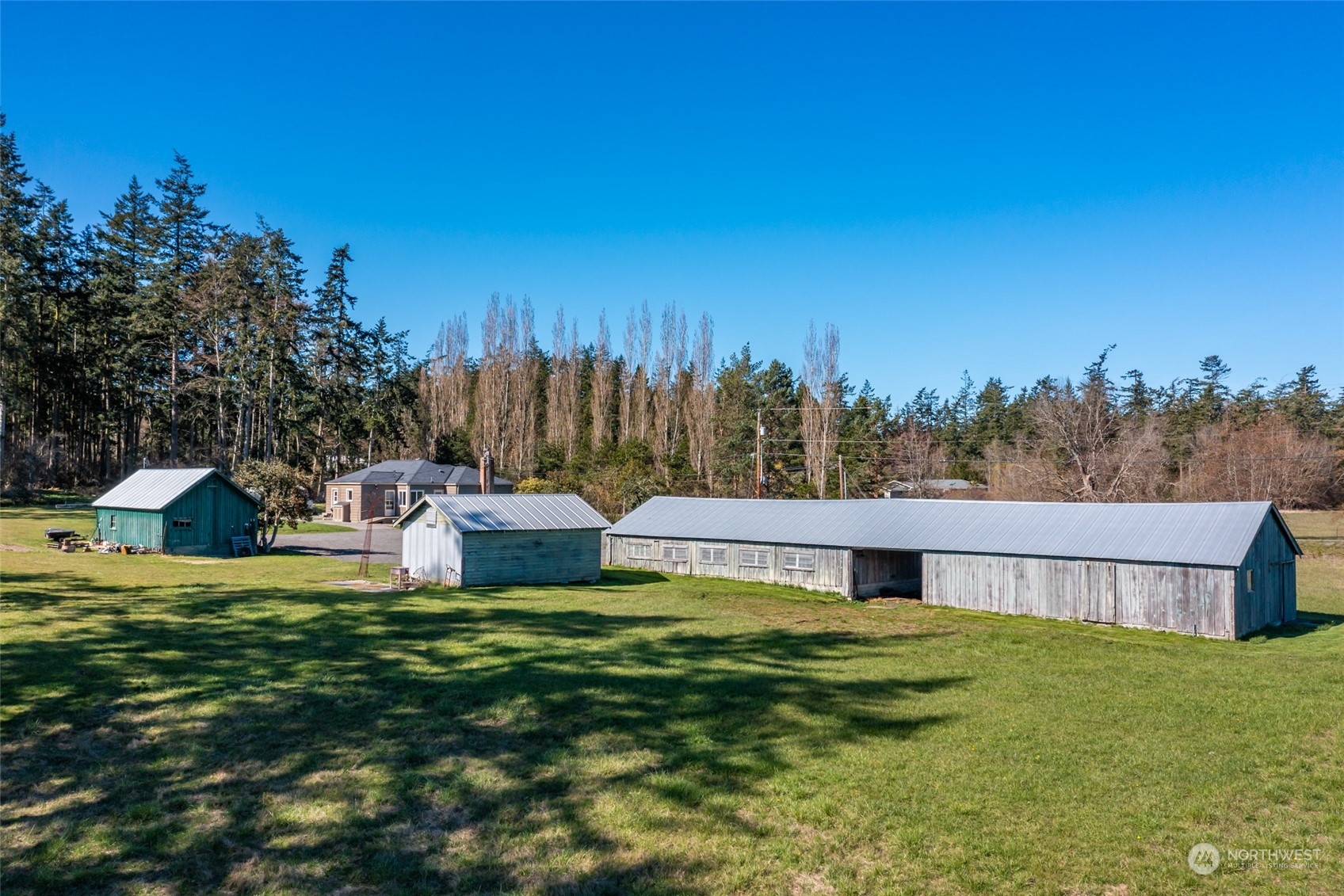 1932 Zylstra Road Oak Harbor, WA 98277 - Photo 27 of 40 a view of a house with a yard
