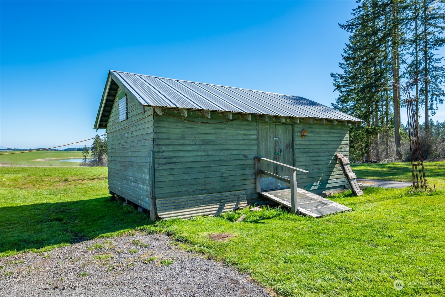 1932 Zylstra Road Oak Harbor, WA 98277 - Photo 33 of 40 a view of a house with a backyard