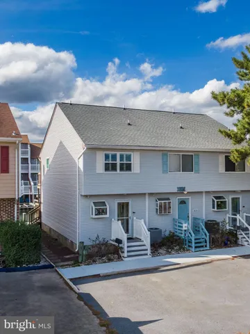 a front view of a house with yard