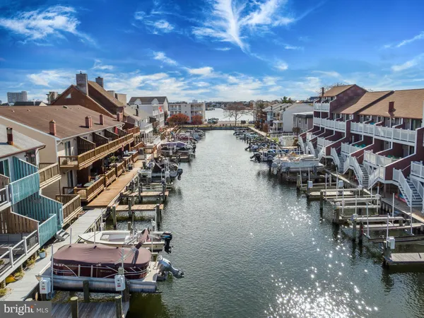 a view of residential houses with outdoor space