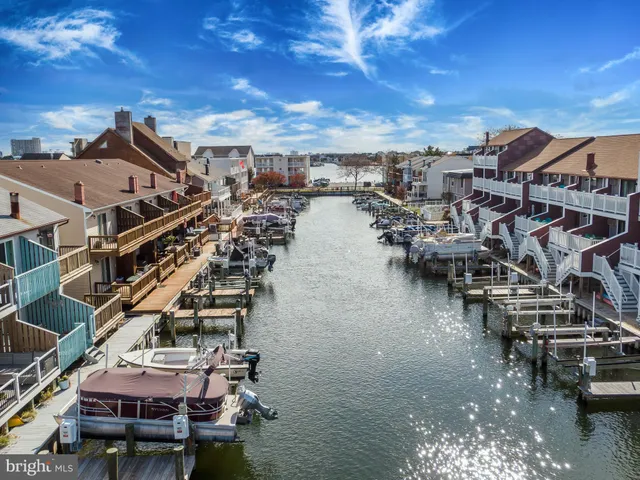 a view of residential houses with outdoor space