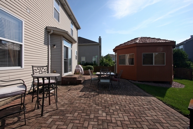 1560 Southgate Road Bartlett, IL 60103 - Photo 23 of 25 a view of backyard with a patio