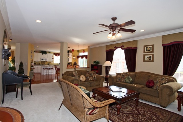 1560 Southgate Road Bartlett, IL 60103 - Photo 8 of 25 a living room with furniture and a large window
