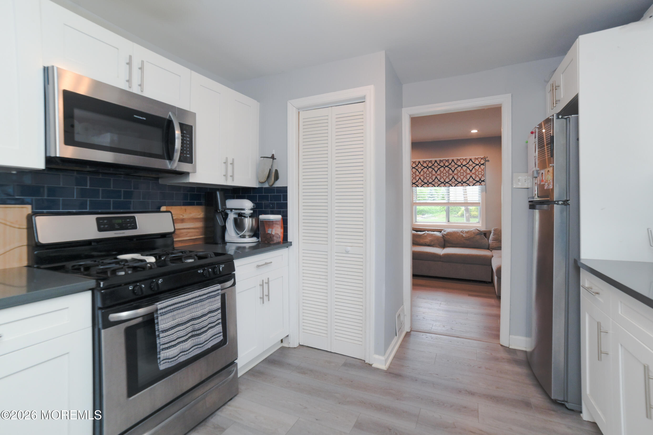501 Gulden Street Keyport, NJ 07735 - Photo 7 of 14 a kitchen with a stove and a microwave