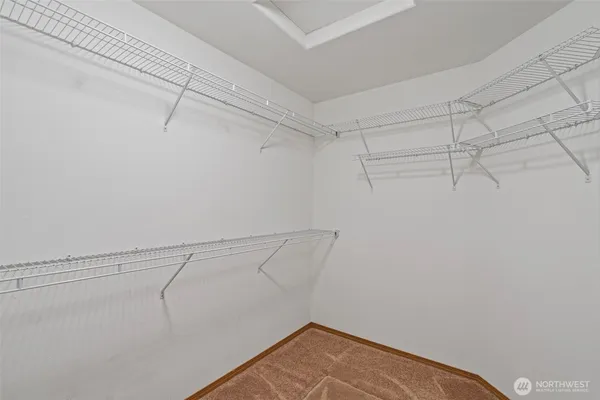 a view of a room with racks on the wall