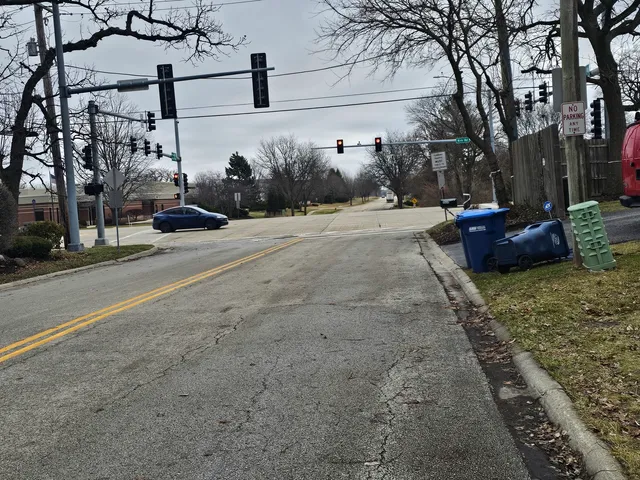 a view of a street with cars on road