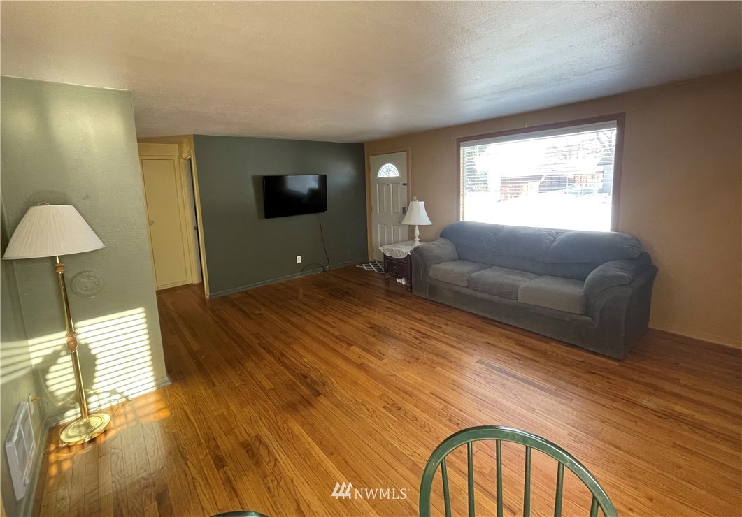 65 F Street Northeast Ephrata, WA 98823 - Photo 5 of 15 a bedroom with a bed and a flat screen tv