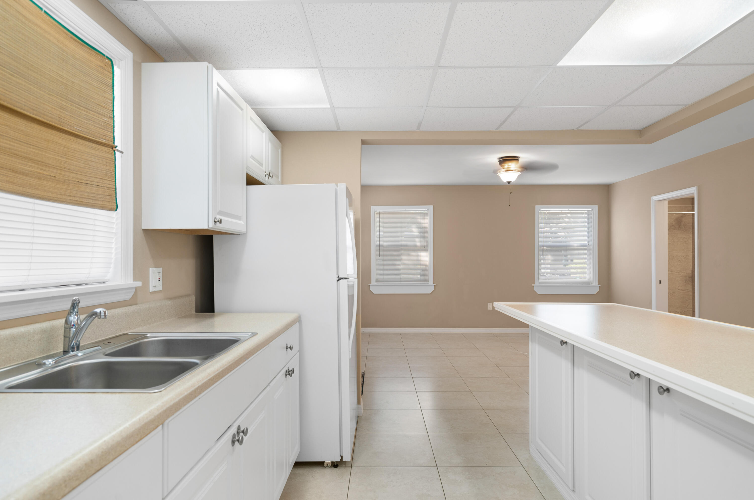 85 Holiday Boulevard Key Largo, FL 33037 - Photo 15 of 20 a kitchen with a sink cabinets and window