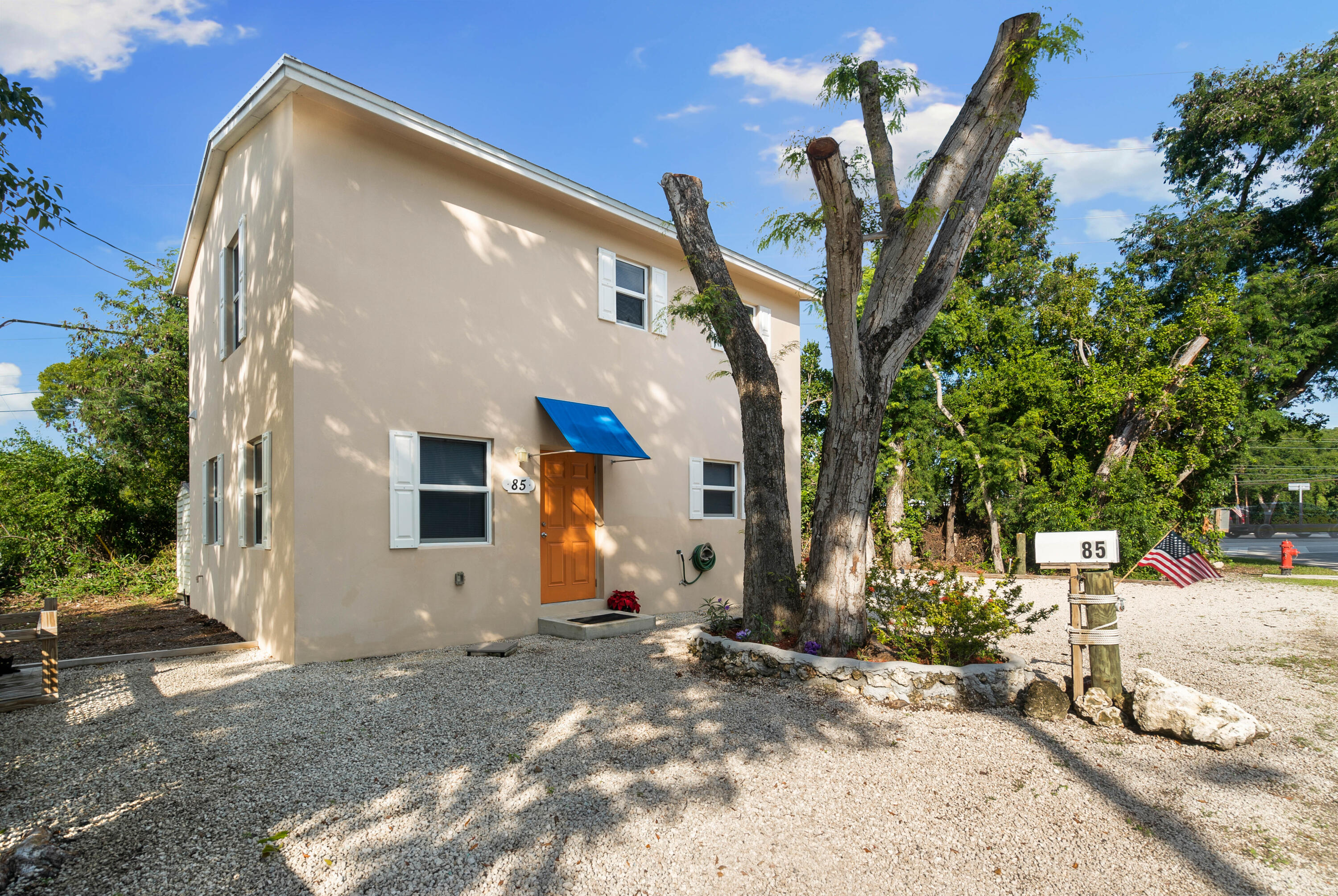 85 Holiday Boulevard Key Largo, FL 33037 - Photo 17 of 20 a view of a house with a tree