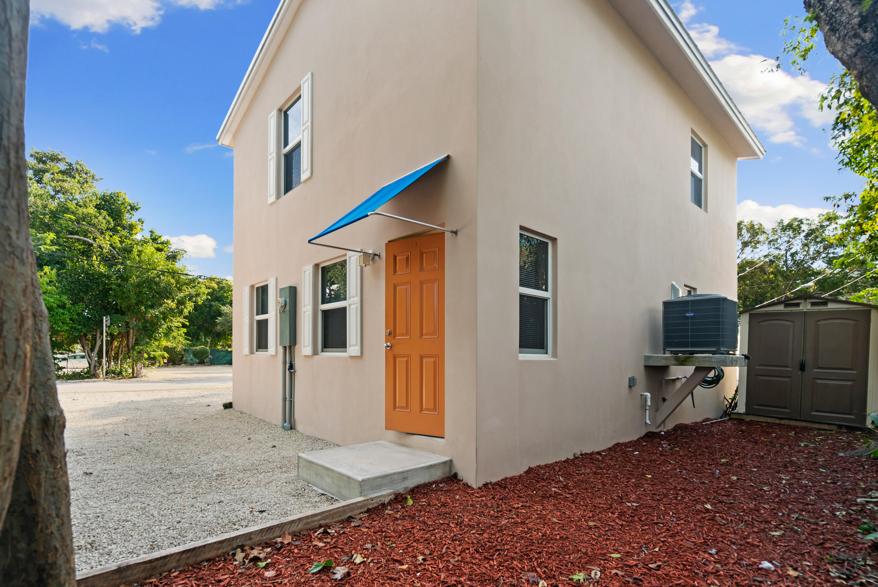 85 Holiday Boulevard Key Largo, FL 33037 - Photo 20 of 20 a view of a house with backyard and sitting area