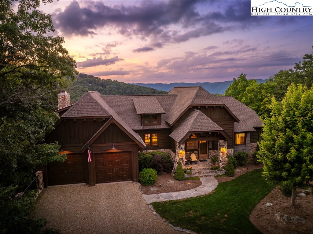 113 Pepperroot Road Boone, NC 28607 - Photo 1 of 50 a front view of a house with garden