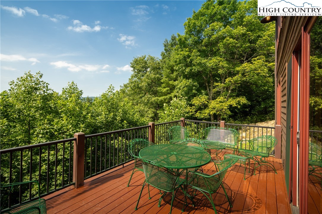 113 Pepperroot Road Boone, NC 28607 - Photo 23 of 50 a view of a balcony with chairs