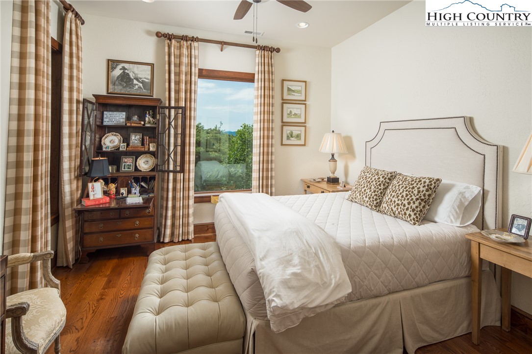 113 Pepperroot Road Boone, NC 28607 - Photo 29 of 50 a bedroom with a bed and a couch