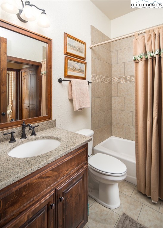 113 Pepperroot Road Boone, NC 28607 - Photo 31 of 50 a bathroom with a granite countertop toilet sink and shower