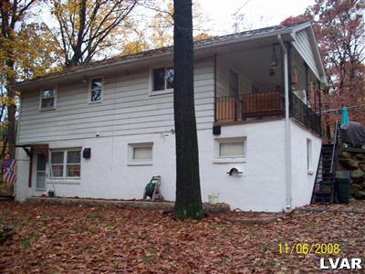930 East Rock Road Allentown, PA 18103 - Photo 5 of 30 Back of home featuring the private entrance to the Lower Level.