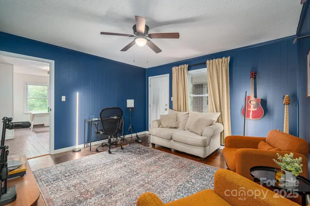 a living room with furniture and window