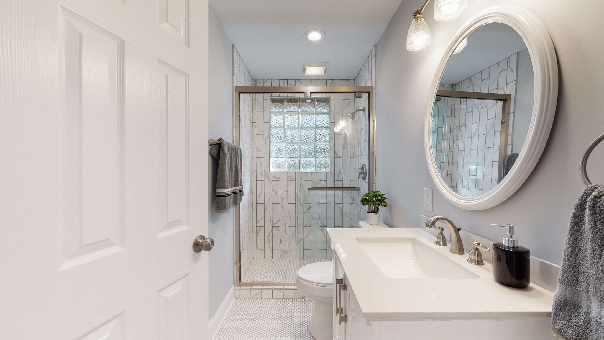 5514 Vanderbilt Road Old Hickory, TN 37138 - Photo 28 of 32 a bathroom with a sink a toilet and a mirror