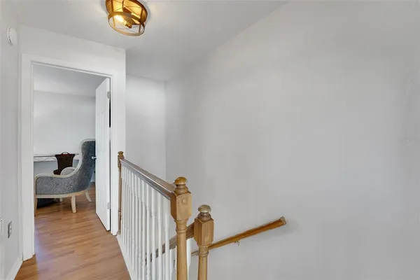 a view of a hallway with a couch