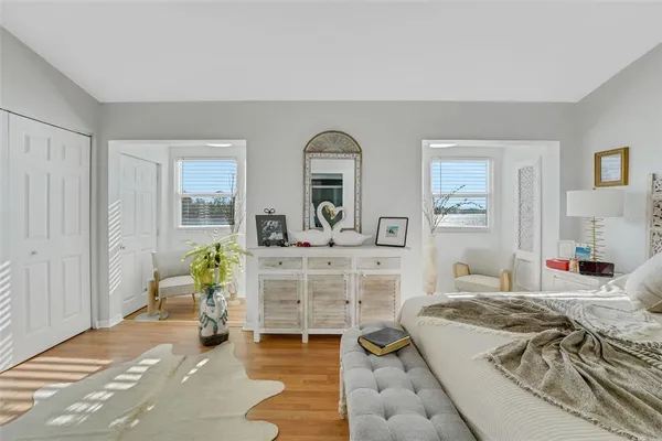 a bedroom with a bed and a dresser