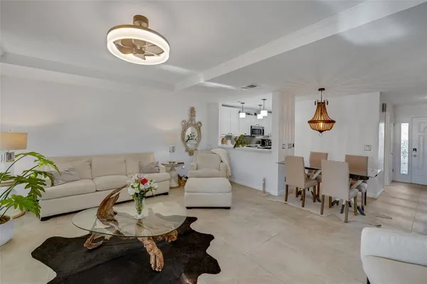 a living room with furniture and rug