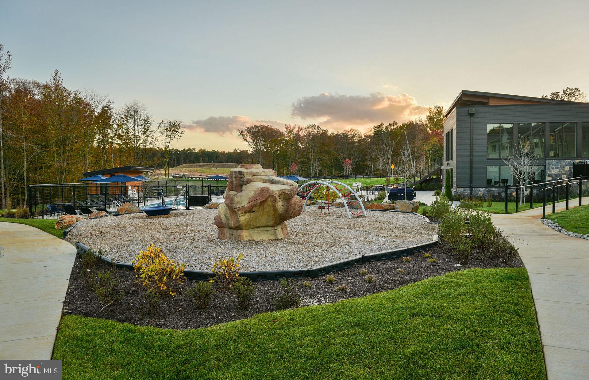 1311 Bracken Lane Laurel, MD 20724 - Photo 36 of 61 a view of a swimming pool with a patio