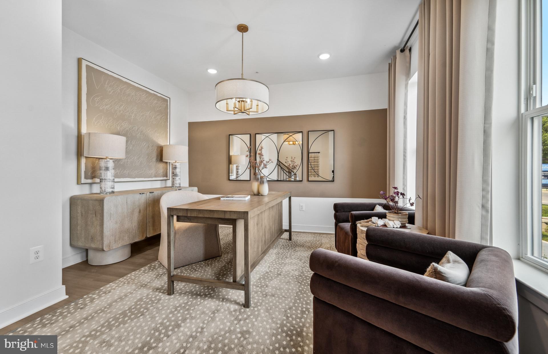 1311 Bracken Lane Laurel, MD 20724 - Photo 4 of 61 a living room with furniture a dining table and a chandelier