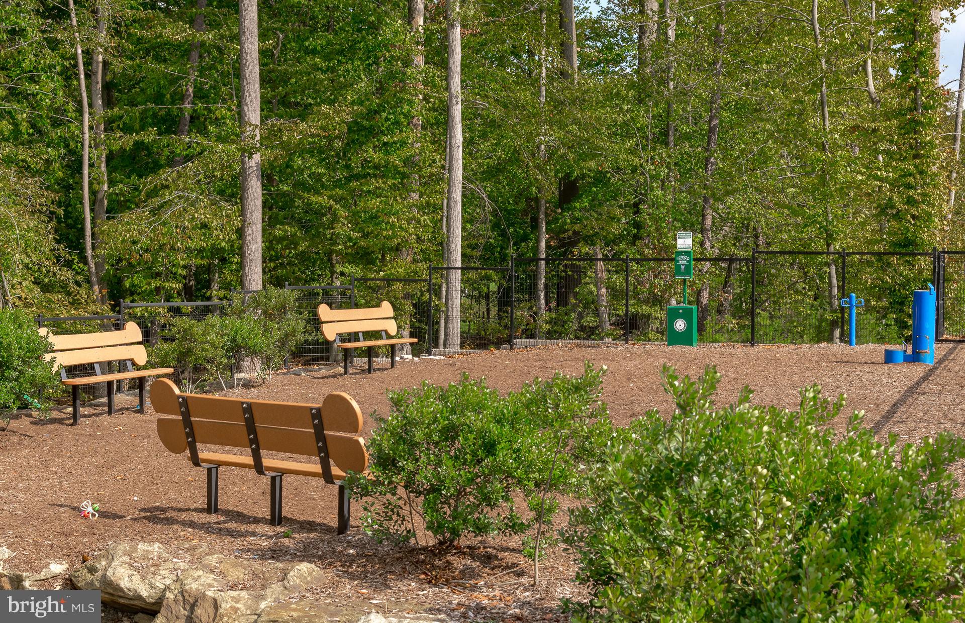1311 Bracken Lane Laurel, MD 20724 - Photo 52 of 61 a backyard of a house with table and chairs