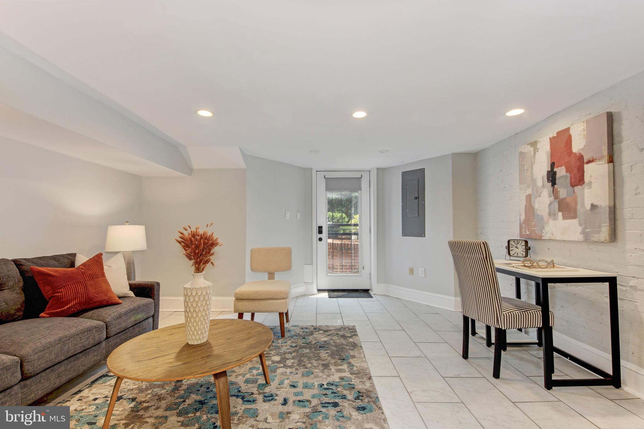 644 5th Street Northeast Washington, DC 20002 - Photo 13 of 51 Lower level rec room with French door