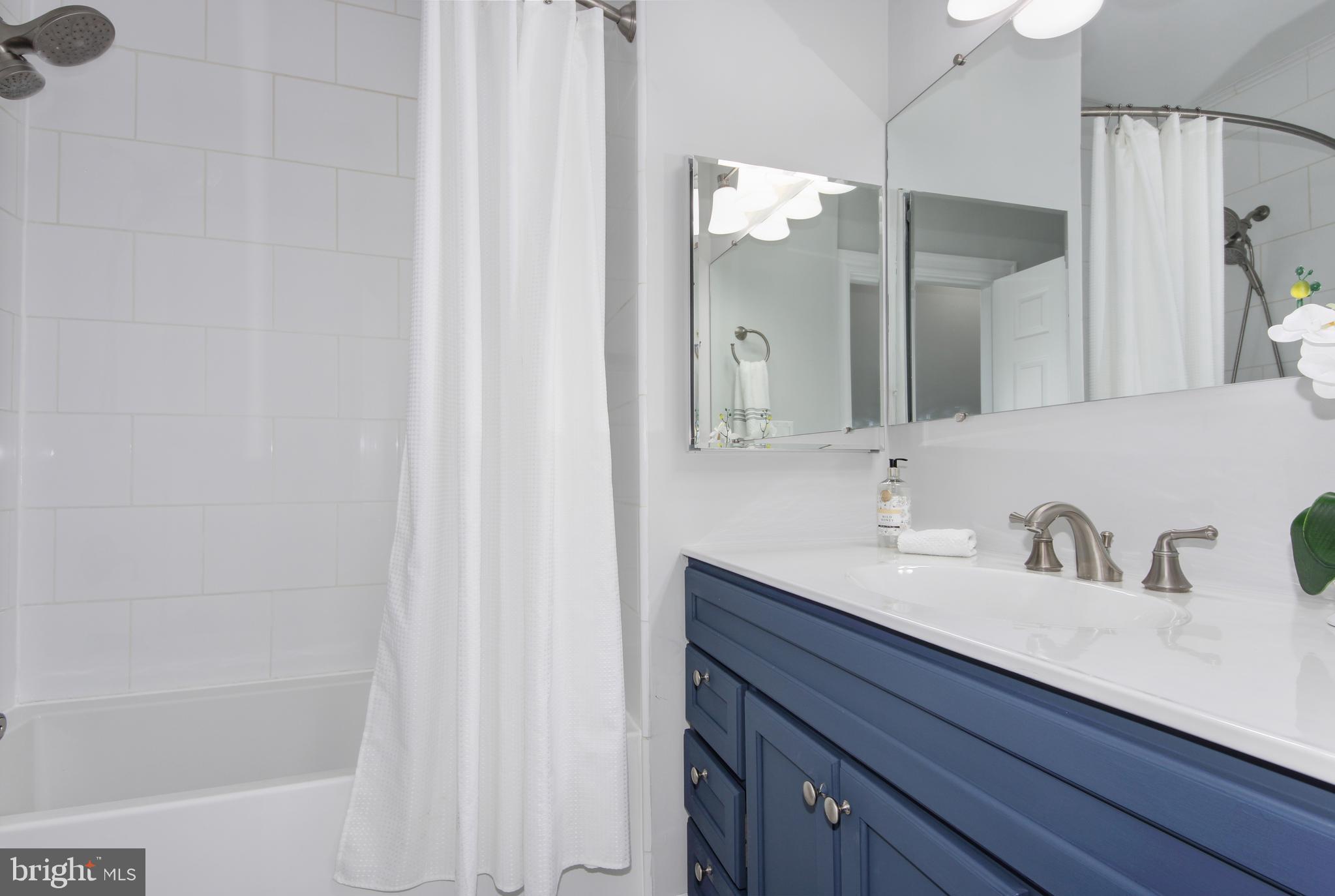 644 5th Street Northeast Washington, DC 20002 - Photo 24 of 51 Upper level bath w/ ceramic tile and tub/shower