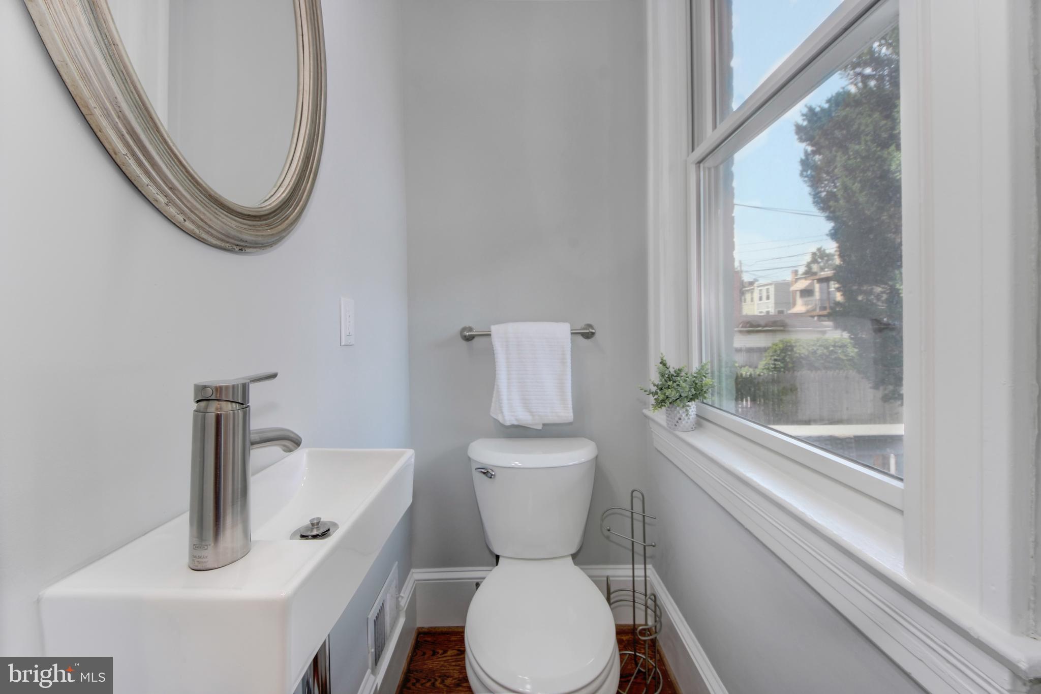 644 5th Street Northeast Washington, DC 20002 - Photo 26 of 51 Convenient powder room on main level
