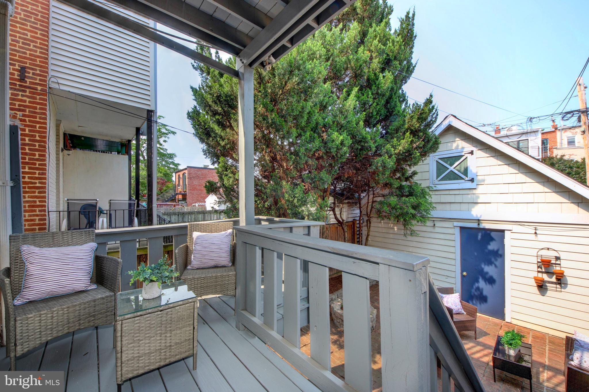 644 5th Street Northeast Washington, DC 20002 - Photo 29 of 51 Two-level deck overlooking private rear courtyard