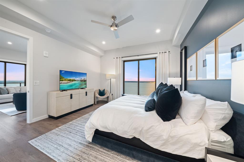 3111 Sunset Boulevard, Unit 915 Flower Mound, TX 75022 - Photo 11 of 39 a large bedroom with bed and window