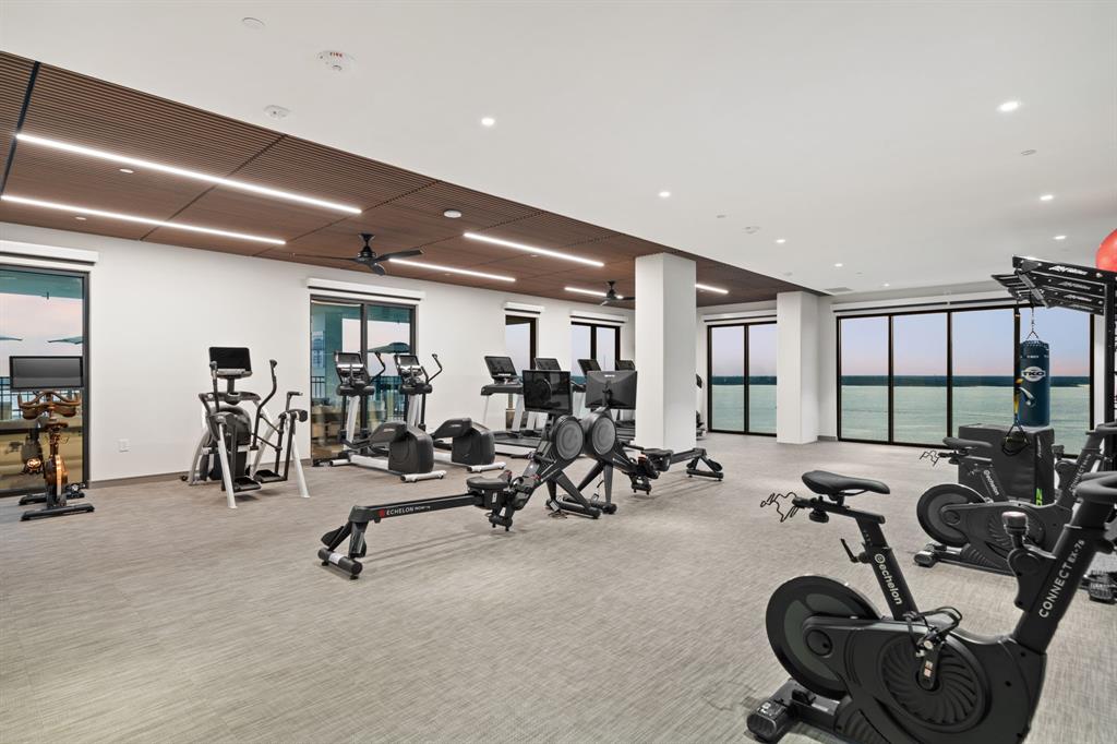 3111 Sunset Boulevard, Unit 915 Flower Mound, TX 75022 - Photo 18 of 39 a view of a room with gym equipment