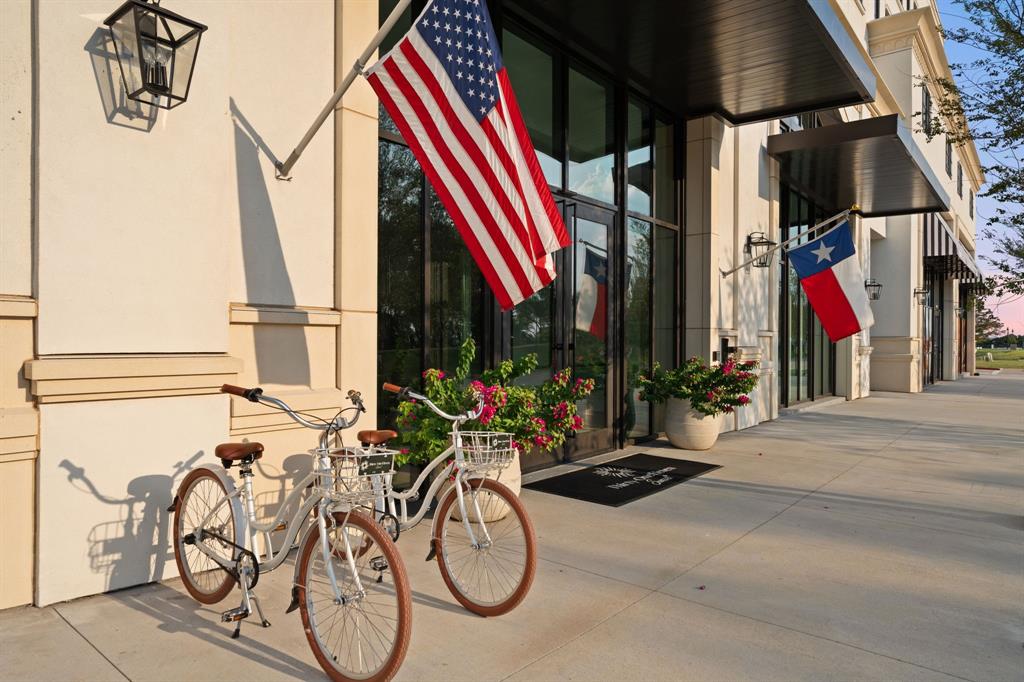 3111 Sunset Boulevard, Unit 915 Flower Mound, TX 75022 - Photo 38 of 39 a view of bike storage next to a tall building