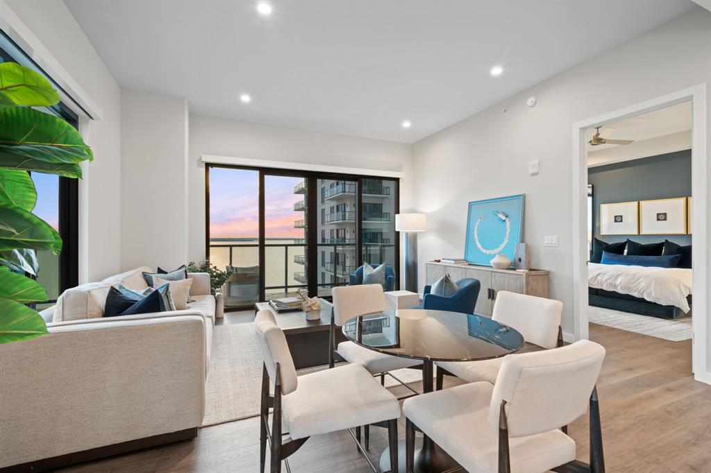 3111 Sunset Boulevard, Unit 915 Flower Mound, TX 75022 - Photo 8 of 39 a living room with furniture and a large window