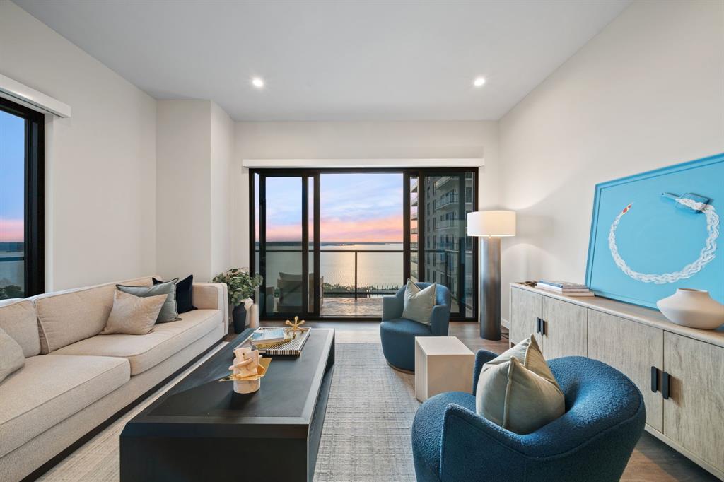 3111 Sunset Boulevard, Unit 915 Flower Mound, TX 75022 - Photo 9 of 39 a living room with furniture and a large window