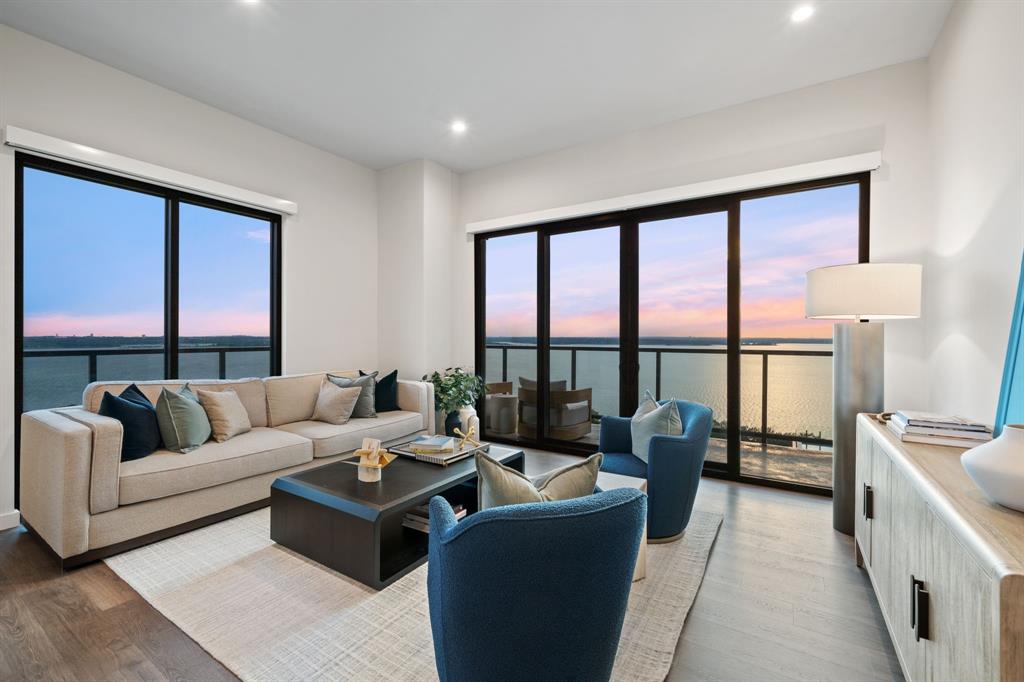 3111 Sunset Boulevard, Unit 915 Flower Mound, TX 75022 - Photo 10 of 39 a living room with furniture and a large window