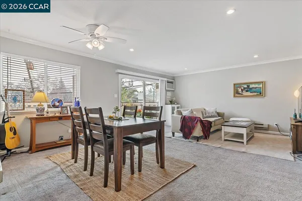 a view of a dining room with furniture