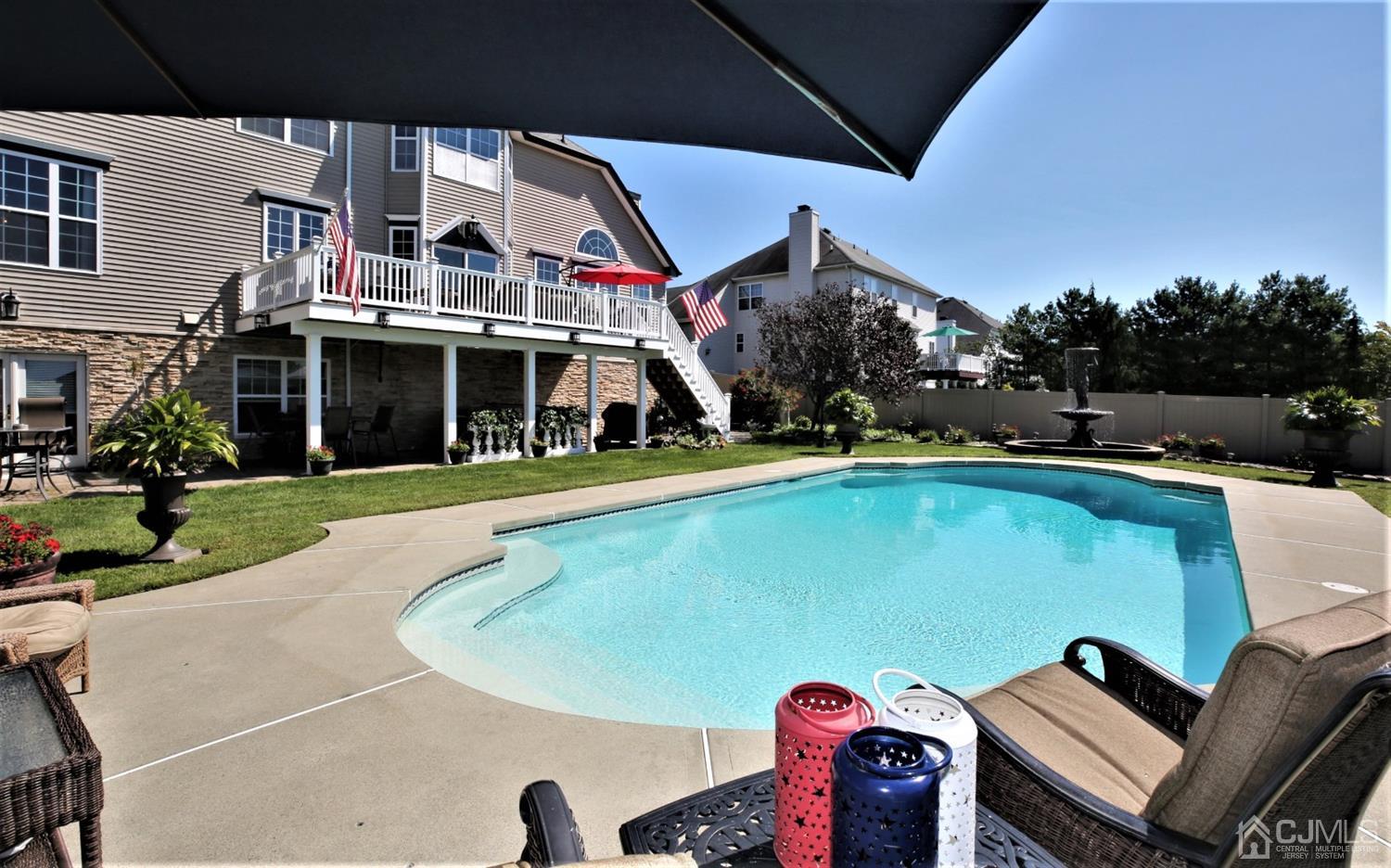 1 MacFarlane Circle Monroe Township, NJ 08831 - Photo 17 of 26 a view of a house with swimming pool