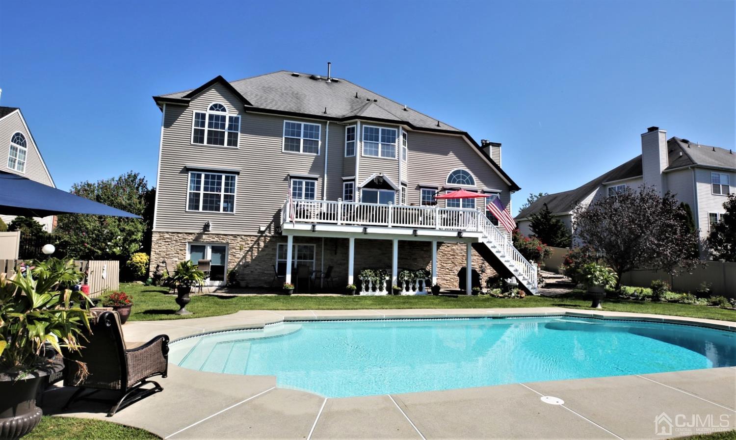 1 MacFarlane Circle Monroe Township, NJ 08831 - Photo 7 of 26 a front view of house with yard and green space