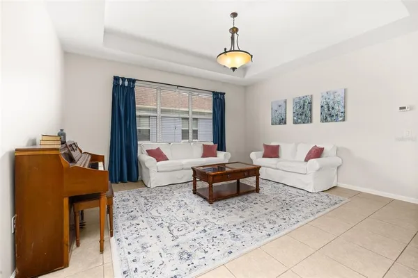 a living room with furniture and a table