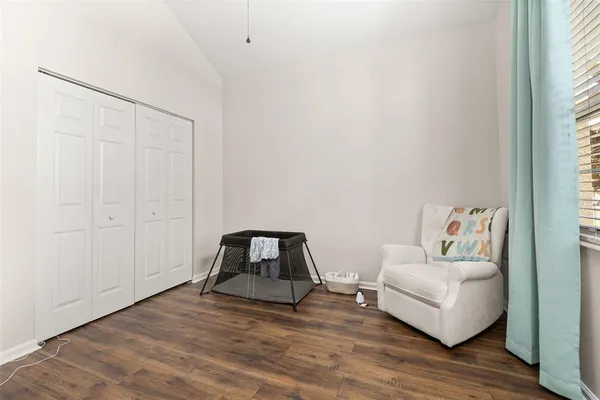 a room with a couch and a window