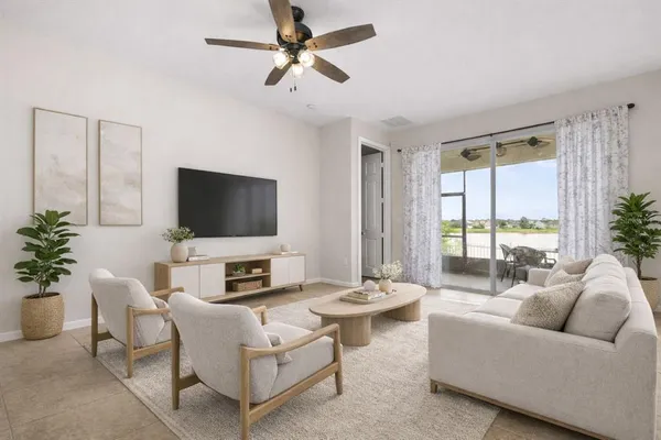 a living room with furniture and a table