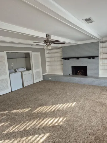 a view of a livingroom with a staircase