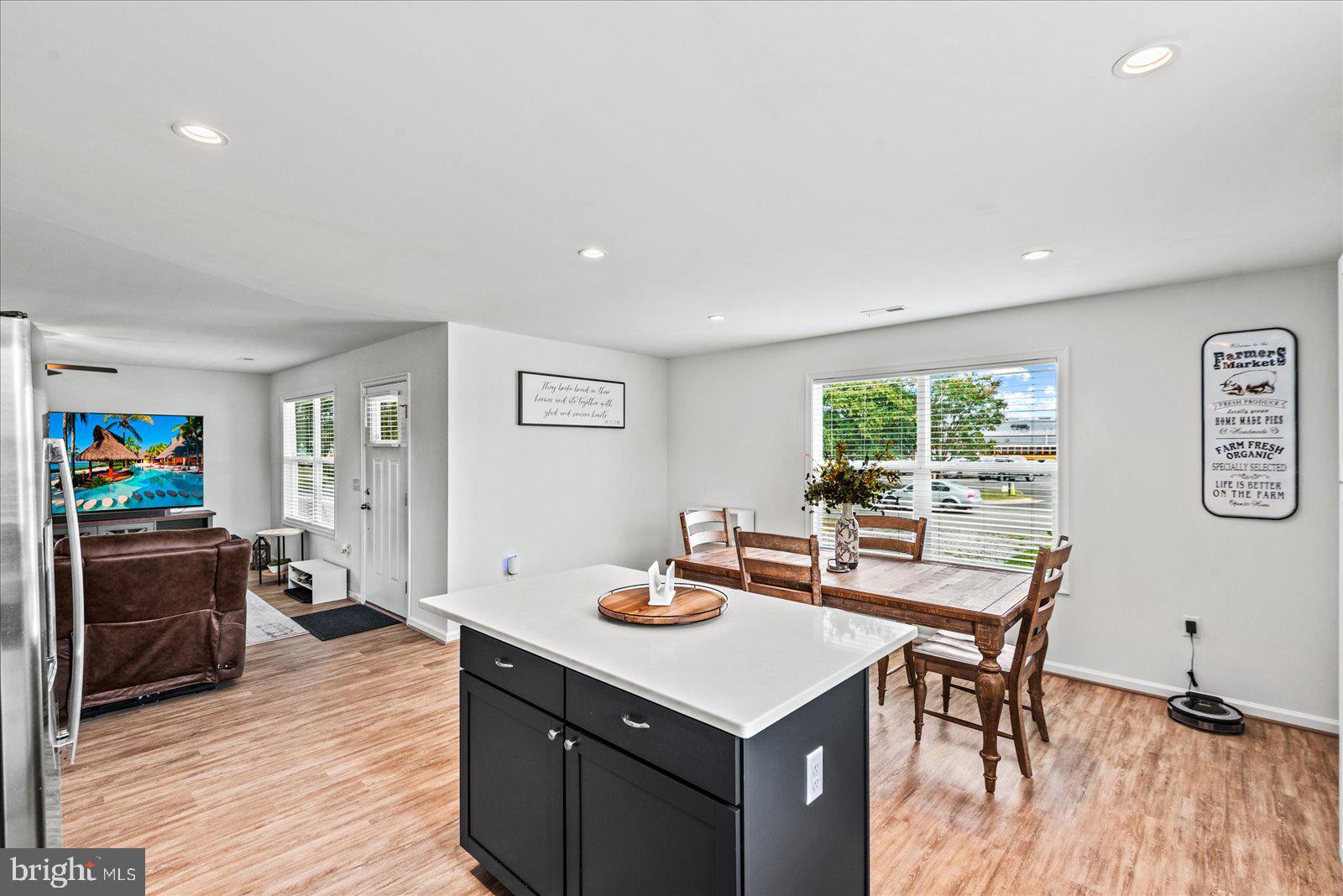 121 1st Street Colonial Beach, VA 22443 - Photo 12 of 46 a kitchen with a table and chairs in it