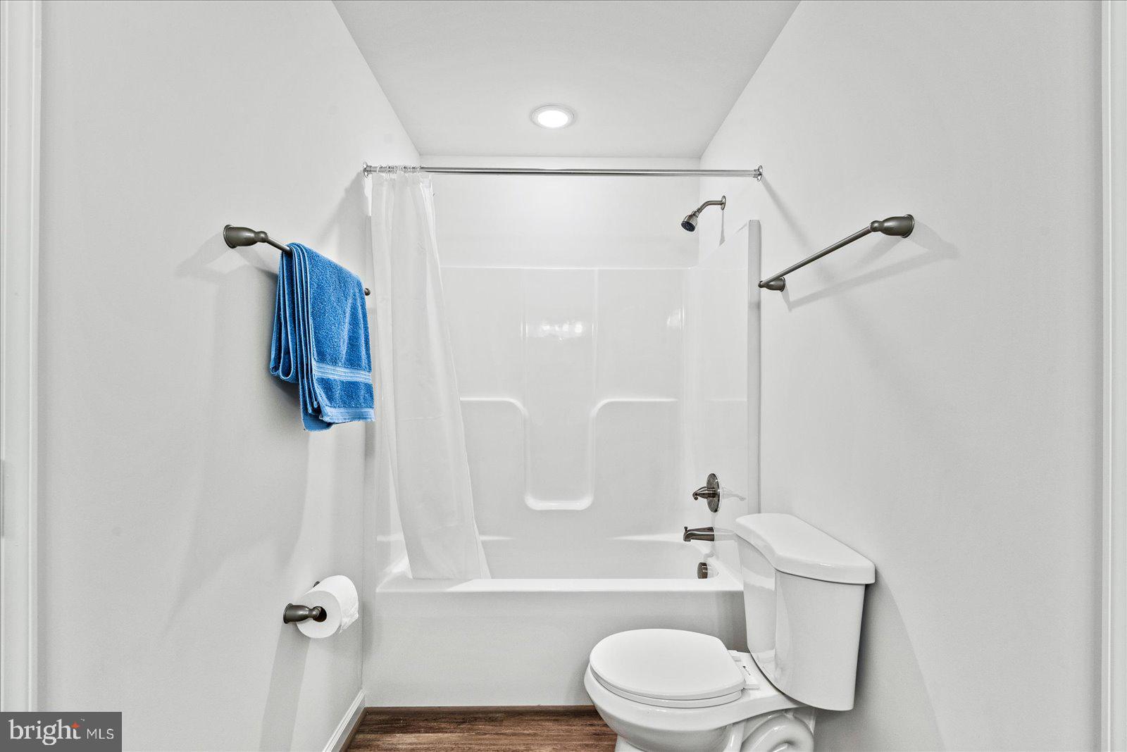 121 1st Street Colonial Beach, VA 22443 - Photo 19 of 46 a bathroom with a toilet sink and shower