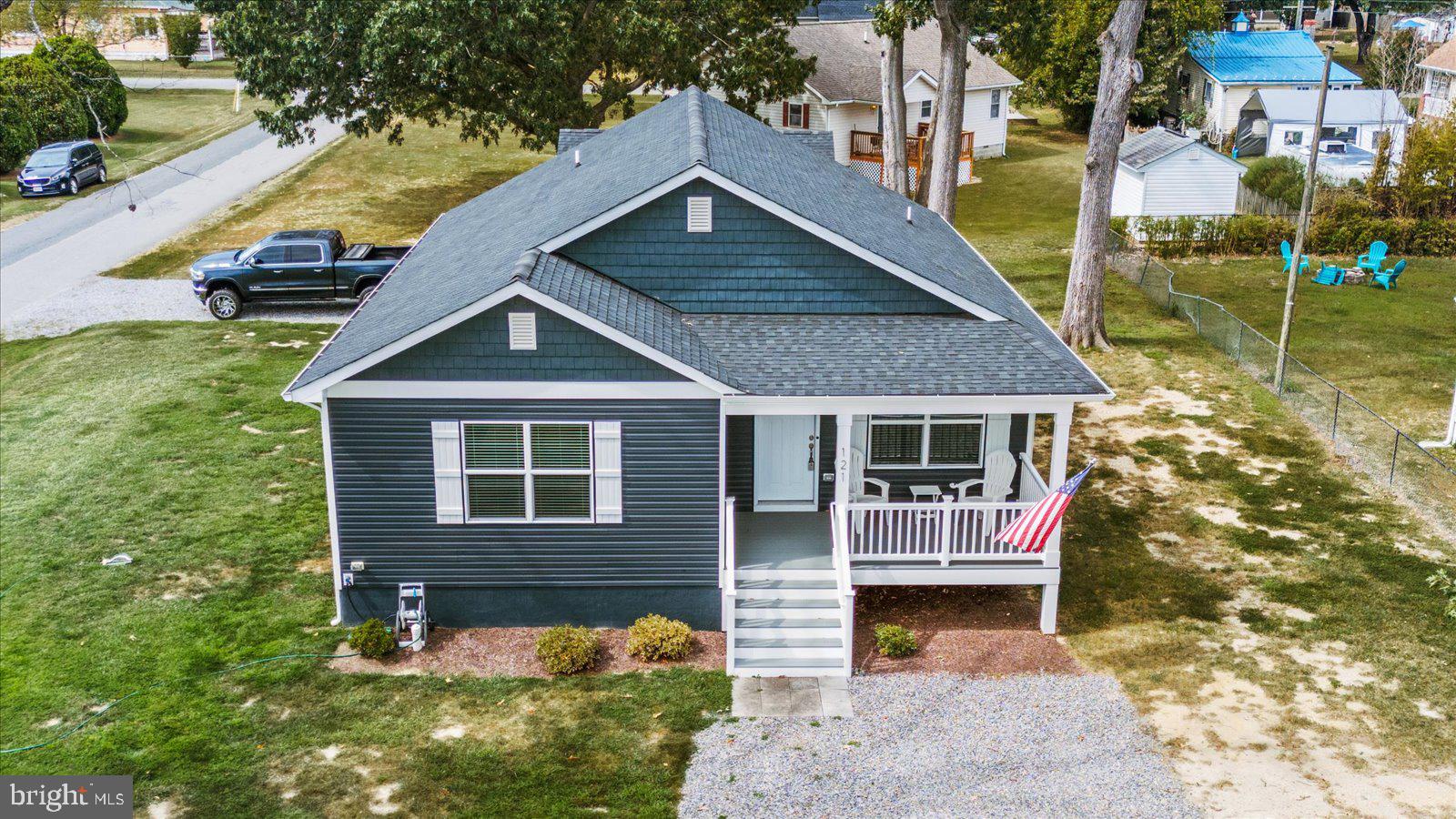 121 1st Street Colonial Beach, VA 22443 - Photo 33 of 46 a front view of a house with garden